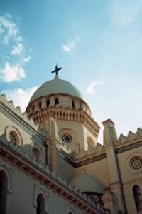Beautiful low-angle shot of cathedral dome against blue sky in Annaba, Algeria.