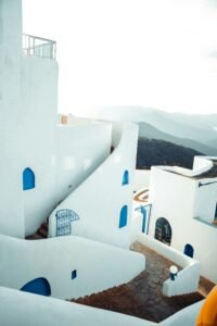 Beautiful white buildings with blue accents in Annaba, Algeria, capturing serene Mediterranean architecture.