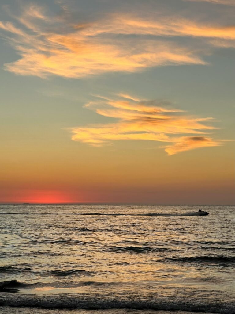 Peaceful sunset view over the sea in Mostaganem, Algeria with a tranquil ambiance.