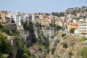 Scenic view of Constantine, Algeria, with its distinct ravine and hillside buildings.